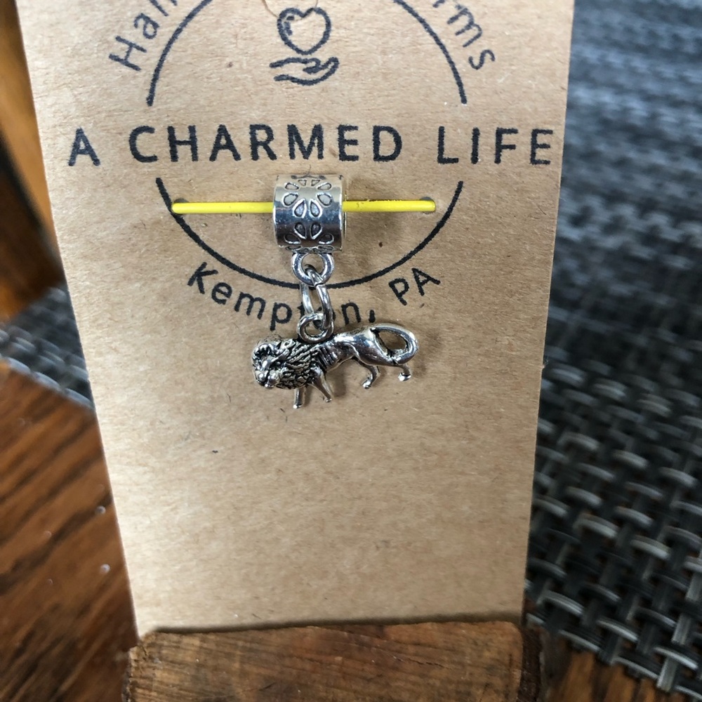 NWT, Handmade by A Charmed Life. Silver Lion & Bail